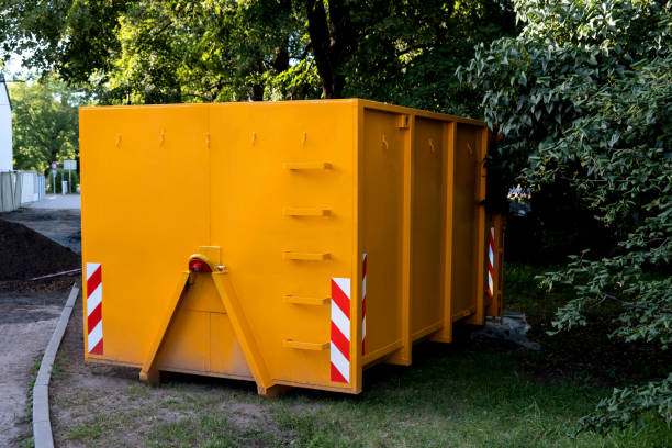 yellow metal construction trash dumpsters container, house renovation.